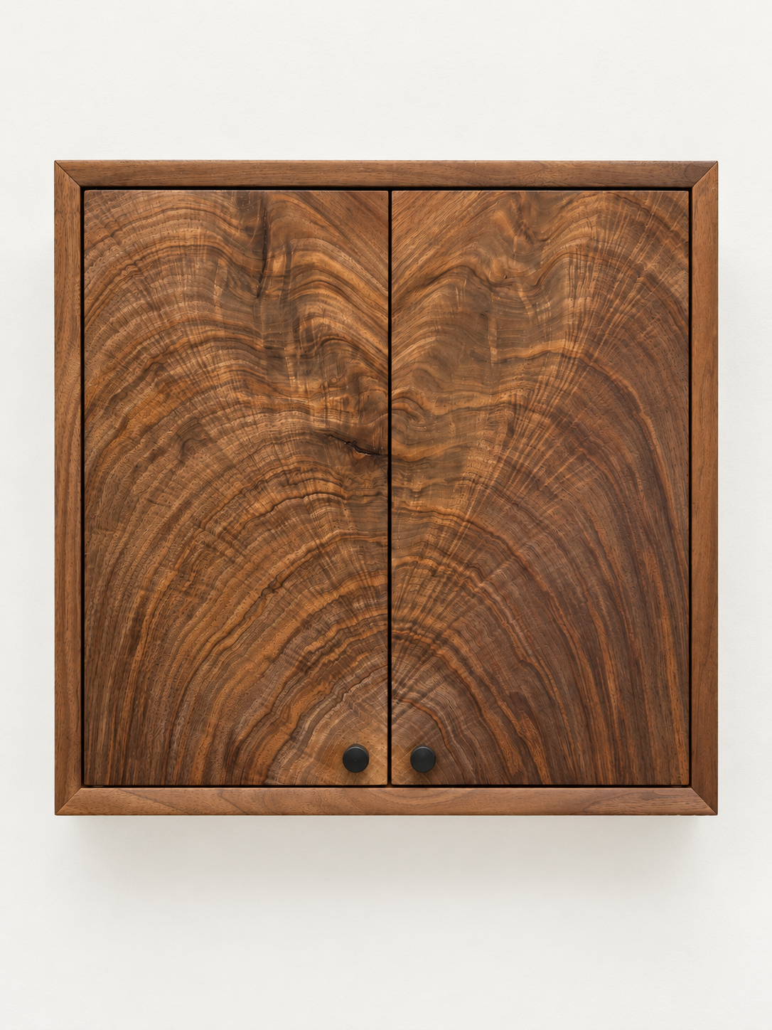 Handcrafted wooden wall cabinet with richly patterned grain